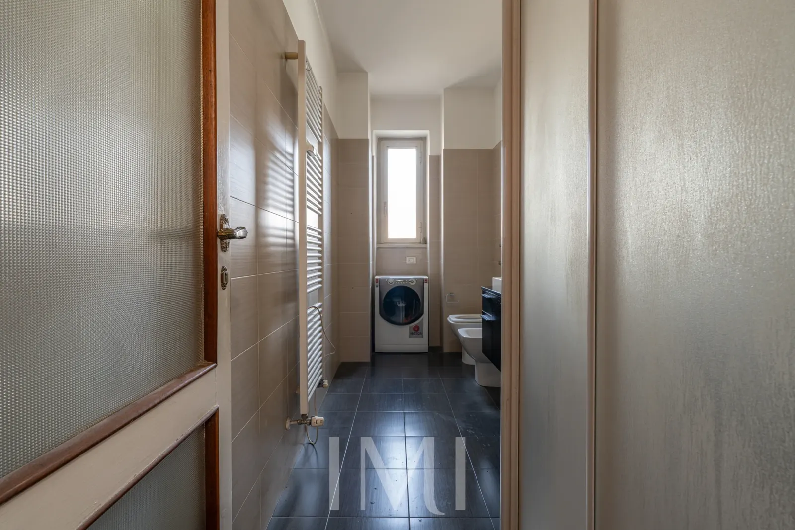Bagno: Piazza S. Belfanti 6